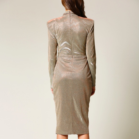 Stunning gold dress that glistens as you move. Features a wrap-inspired skirt. - Picture 3 of 4